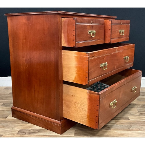 86 - A late 20th century campaign chest of drawer, slight oversailing top above two short drawers and two... 