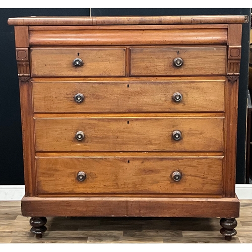 87 - A Victorian walnut chest of one long blind, two short above three long graduated drawers, turned and... 