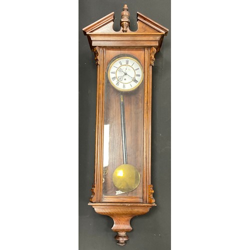 106 - A early 20th century Vienna wall clock, white dial, Roman numerals, mechanical movement, 100cm high.