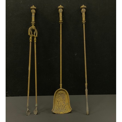 135 - An Indian Brass tray, embossed and incised with Buddhist figures and foliate, shaped rim; two pairs ... 