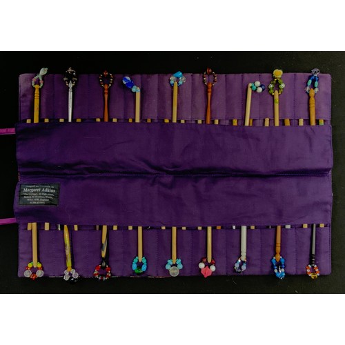 156 - A collection of 20th century lace making bobbins, inc turned wooden, metal, and painted examples, gl... 