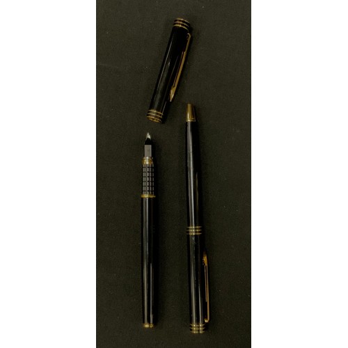 166 - A Waterman Ideal Fountain pen and ball point two piece pen set, black and gold exteriors, , fountain... 