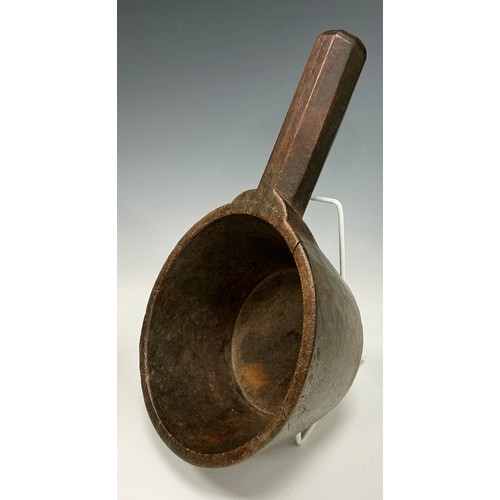 185 - A 19th century treen herb and spice bowl/mortar, conical pan bowl, 17,2cm diameter, with octagonal h... 