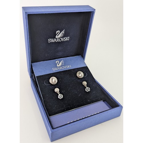 306 - A selection of costume jewellery;
to include a pair of swarovski crystal stud earrings boxed, a swar... 