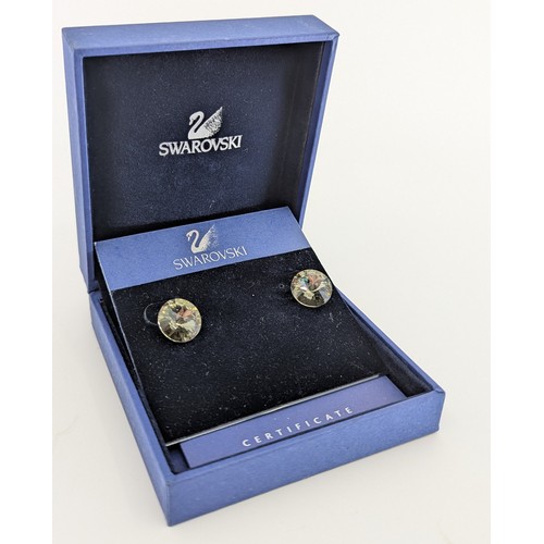 306 - A selection of costume jewellery;
to include a pair of swarovski crystal stud earrings boxed, a swar... 