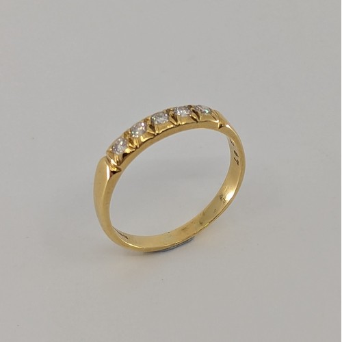 342 - An 18ct gold diamond five stone ring,
set with five approx. 0.02ct round brilliant cut diamonds, tot... 