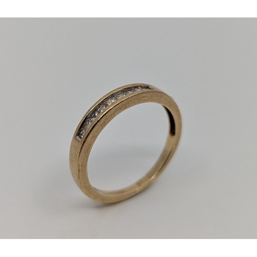 345 - A 9ct gold princess cut diamond nine stone ring, 
set with nine melee princess cut diamonds, 
hallma... 