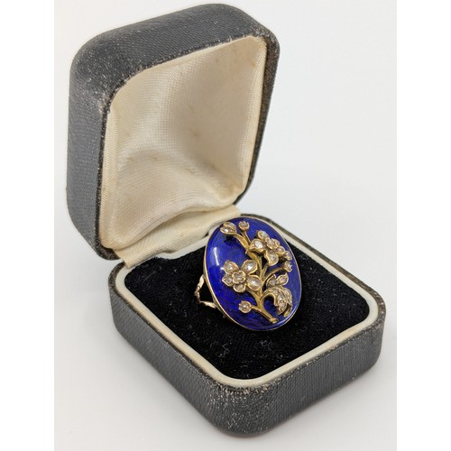 347 - A Victorian 9ct rose and yellow gold blue enamel and diamond set forget me not mourning ring, 
set w... 