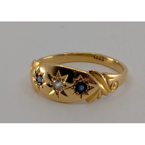 318 - A Victorian 18ct gold sapphire and diamond trilogy ring,
set with a central melee old European cut d... 