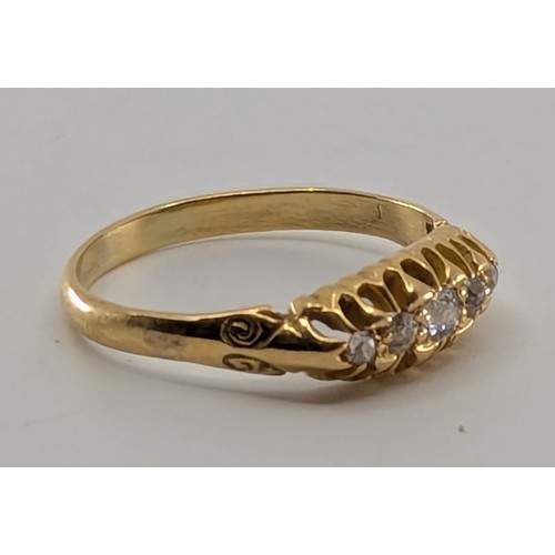 358 - A Victorian 18ct gold diamond five stone ring, 
set with five melee old mine cut diamonds, stamped 