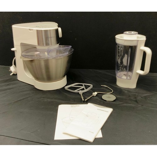 63 - A Kenwood Kitchen Machine which includes, a blender, multi food grinder, citrus press, food processo... 
