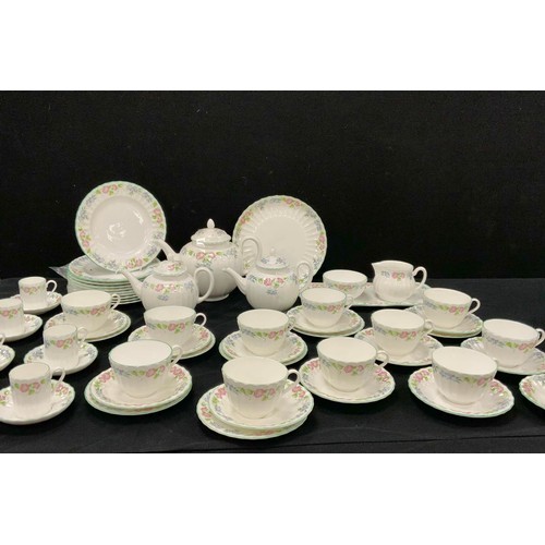 71 - Royal Worcester English garden pattern comprised of, a tea pot, two smaller tea pots, milk jug, suga... 