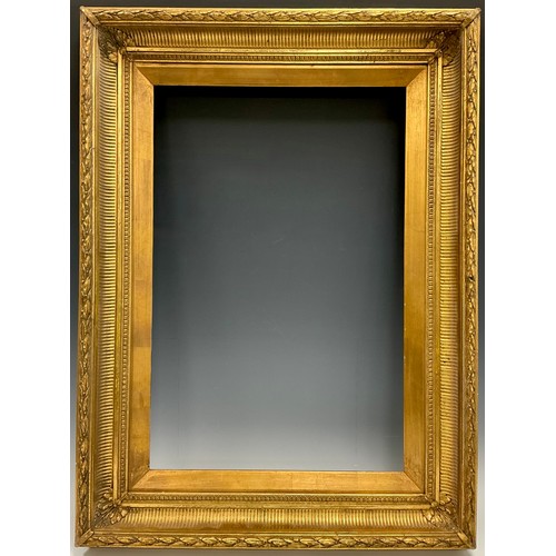 521 - A pair of 19th century fluted cove gilt frames, each measuring 41cm x 61.5cm at the aperture, and 61... 