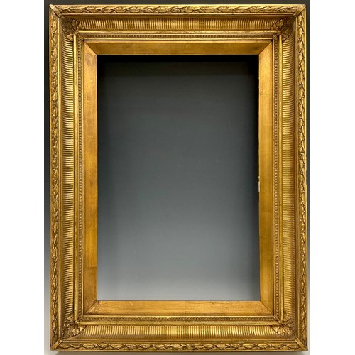 521 - A pair of 19th century fluted cove gilt frames, each measuring 41cm x 61.5cm at the aperture, and 61... 