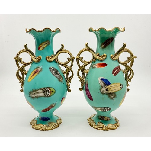 238 - A pair of 19th century vases, possibly Coalbrookdale painted with feathers on a pale turquoise groun... 