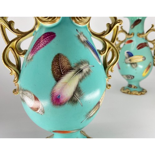 238 - A pair of 19th century vases, possibly Coalbrookdale painted with feathers on a pale turquoise groun... 