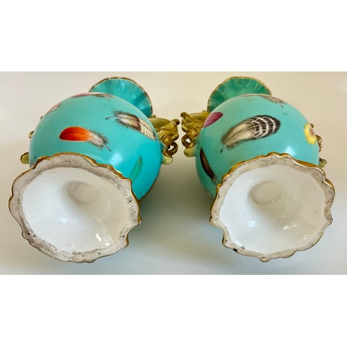 238 - A pair of 19th century vases, possibly Coalbrookdale painted with feathers on a pale turquoise groun... 