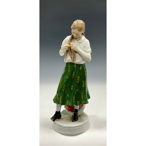216 - An Art Nouveau Meissen porcelain figure of a young girl the design attributed to Alfred Konig, model... 