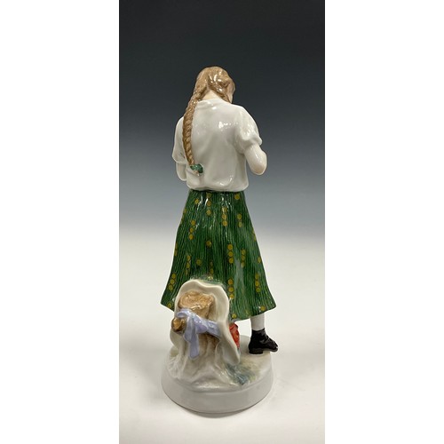 216 - An Art Nouveau Meissen porcelain figure of a young girl the design attributed to Alfred Konig, model... 