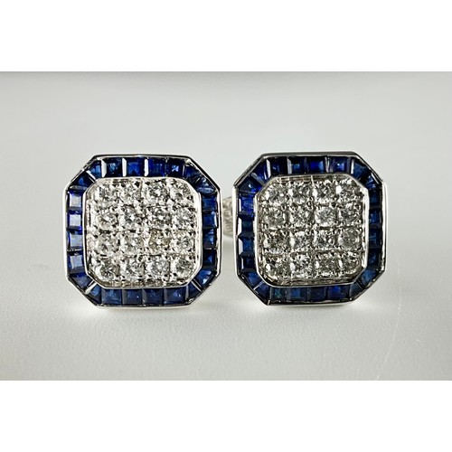 132 - A pair of 18ct white gold sapphire and diamond set cufflinks, each cufflink set with sixteen approx.... 