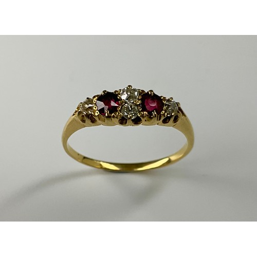 167 - A Victorian tested 18ct gold ruby and diamond ring,
set with two approx. 0.15ct cushion cut red rubi... 