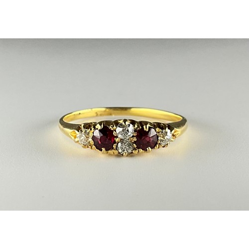 167 - A Victorian tested 18ct gold ruby and diamond ring,
set with two approx. 0.15ct cushion cut red rubi... 