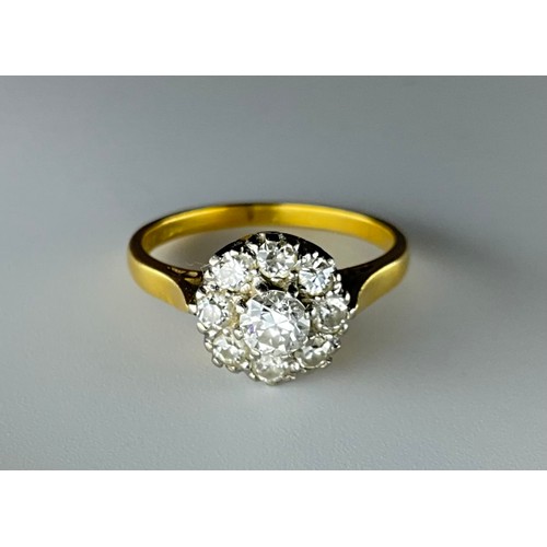 156 - A Victorian 18ct gold diamond cluster ring, 
set with a central old European cut diamond measuring a... 
