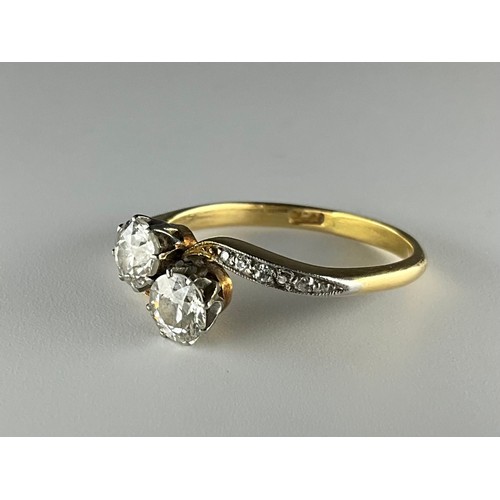 160 - A Victorian 18ct gold two stone Old European cut diamond with diamond shoulders ring,
set with an ap... 