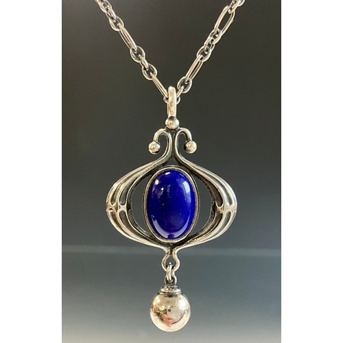 126 - A Georg Jensen lapis lazuli set 2013 Heritage silver pendant necklace, the pendant set with an oval ... 