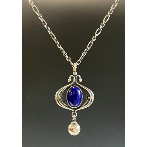 126 - A Georg Jensen lapis lazuli set 2013 Heritage silver pendant necklace, the pendant set with an oval ... 