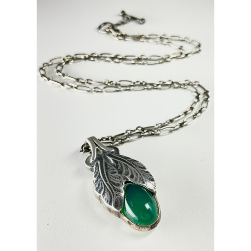 125 - A Georg Jensen green agate set 2008 Heritage silver pendant necklace, the pendant set with an oval c... 