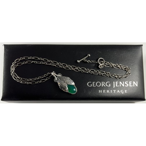 125 - A Georg Jensen green agate set 2008 Heritage silver pendant necklace, the pendant set with an oval c... 