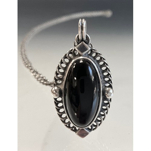 123 - A Georg Jensen black onyx set silver pendant, of the year 2004, with 