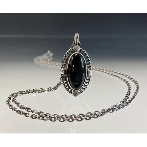 123 - A Georg Jensen black onyx set silver pendant, of the year 2004, with 