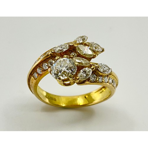 180 - An 18ct gold diamond set dress ring, set with a central approx. 0.75ct old mine cut diamond, diamond... 