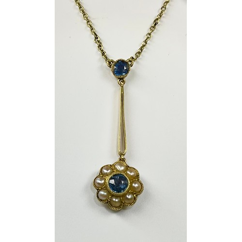 202 - An Art Nouveau 15ct gold sapphire and seed pearl pendant necklace, set with a round old cut cornflow... 