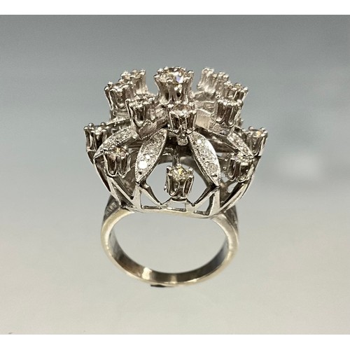 205 - An unmarked white metal diamond cluster ring, open multi-layer floral crest set with forty one round... 