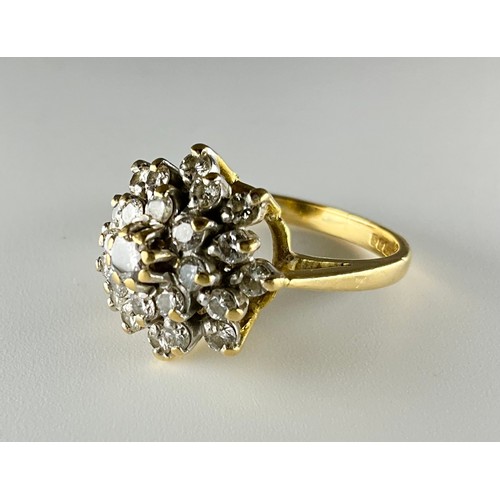 177 - An 18ct gold diamond cluster ring, set with an approx. 0.08ct round brilliant cut diamond in the cen... 