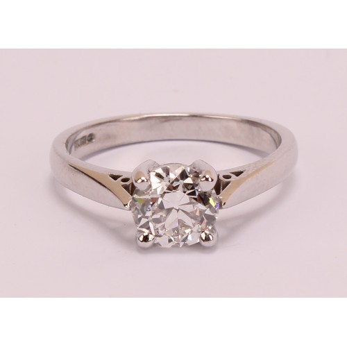 184 - An 18ct white gold and platinum diamond solitaire ring, 18ct white gold mount with platinum four cla... 