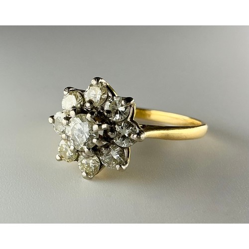 178 - An 18ct gold diamond cluster ring, set with a central approx. 0.40ct round brilliant cut diamond sur... 