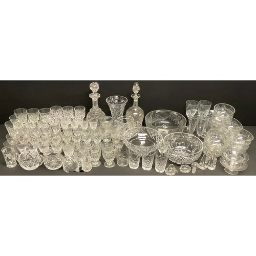 125 - Glassware - a mid 19th century cut glass decanter; an Edwardian cut glass decanter; early 20th centu... 