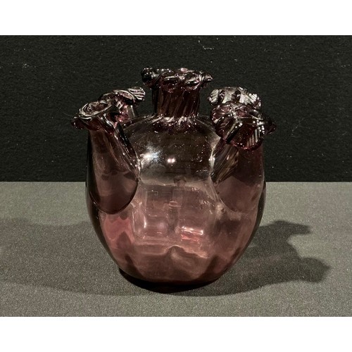 126 - Vittorio Zecchin (1878 - 1947) for Venini, Murano, a soffiato amethyst glass ovoid bud vase, spirall... 