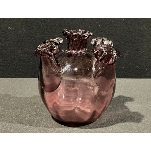 126 - Vittorio Zecchin (1878 - 1947) for Venini, Murano, a soffiato amethyst glass ovoid bud vase, spirall... 