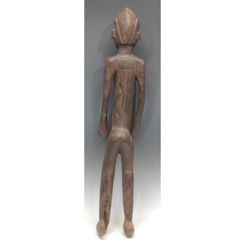 Tribal Art - a Senufo figure, of elongated proportions, stylised ...