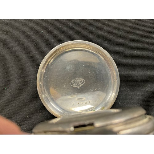 316 - An ornate silver cased pocket watch, 47mm silvered face with secondary seconds dial, Roman numerals,... 