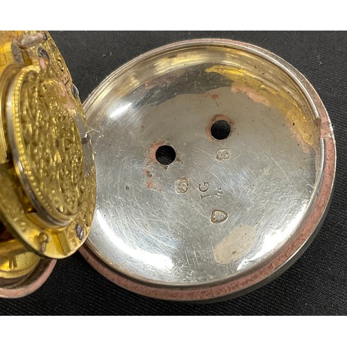 320 - A George III hallmarked silver pair cased verge pocket watch, white enamel dial, Roman numerals, the... 