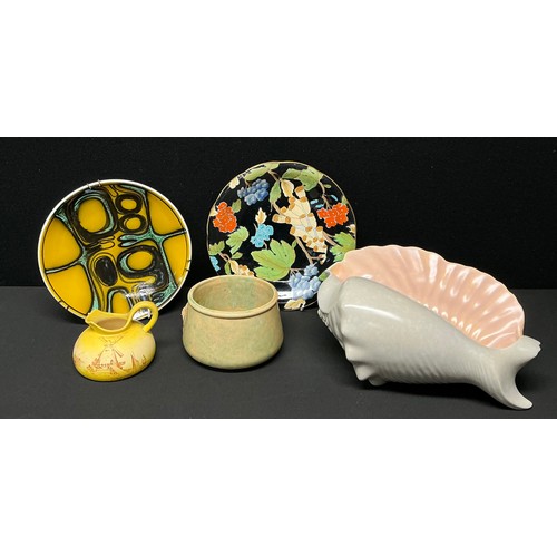 293 - A Poole pottery Adelphis small plate, with stylised geometric decoration on a mustard ground, printe... 