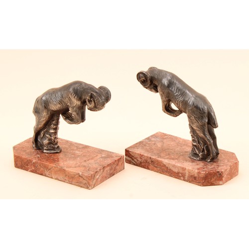 296 - H.Moreau (after), a pair of French Art Deco silvered and marble book ends, cast as a pair of leaping... 