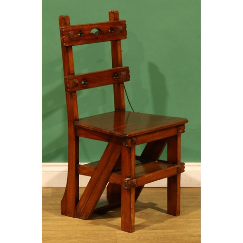 1 - An Arts & Crafts metamorphic library step chair, rectangular cresting and mid rail pierced with quat... 
