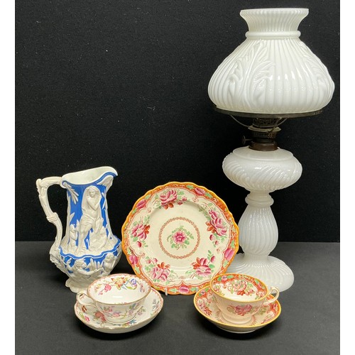 52 - An early 20th century Brenner Kosmos opaque pressed glass oil lamp, wrythen moulded font, pillar and... 